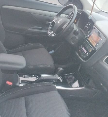 Белый Мицубиси Аутлендер, объемом двигателя 2.4 л и пробегом 119 тыс. км за 17800 $, фото 1 на Automoto.ua