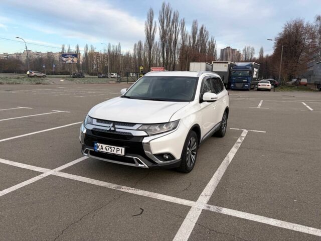 Белый Мицубиси Аутлендер, объемом двигателя 2.4 л и пробегом 168 тыс. км за 19500 $, фото 2 на Automoto.ua