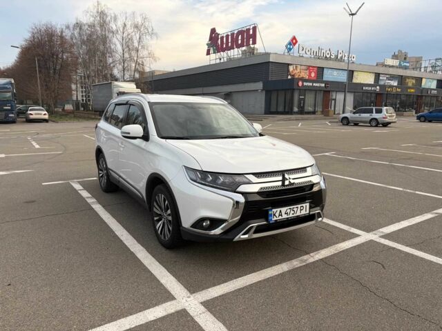 Белый Мицубиси Аутлендер, объемом двигателя 2.4 л и пробегом 168 тыс. км за 19500 $, фото 3 на Automoto.ua