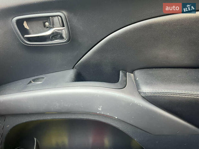 Білий Міцубісі Аутлендер, об'ємом двигуна 2 л та пробігом 269 тис. км за 7900 $, фото 9 на Automoto.ua