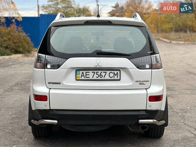 Белый Мицубиси Аутлендер, объемом двигателя 2.36 л и пробегом 160 тыс. км за 9299 $, фото 6 на Automoto.ua