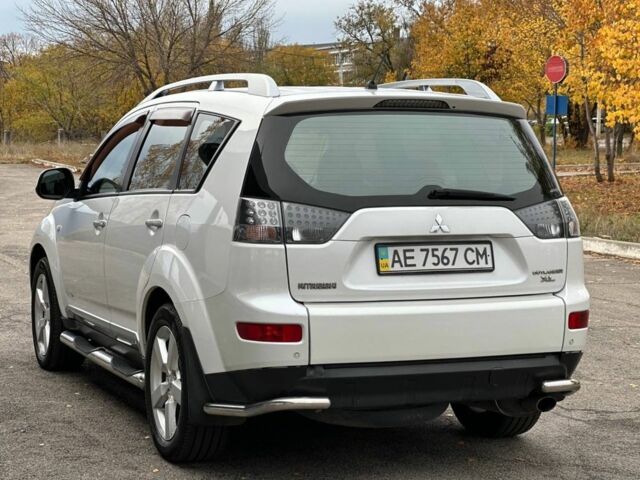 Білий Міцубісі Аутлендер, об'ємом двигуна 2.4 л та пробігом 160 тис. км за 9299 $, фото 5 на Automoto.ua