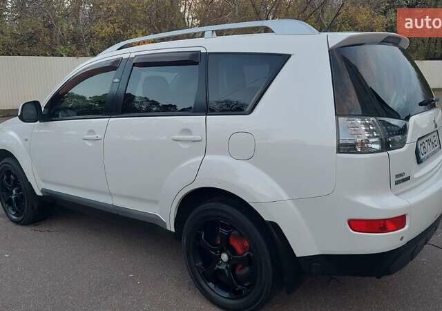 Белый Мицубиси Аутлендер, объемом двигателя 2.36 л и пробегом 185 тыс. км за 8950 $, фото 16 на Automoto.ua