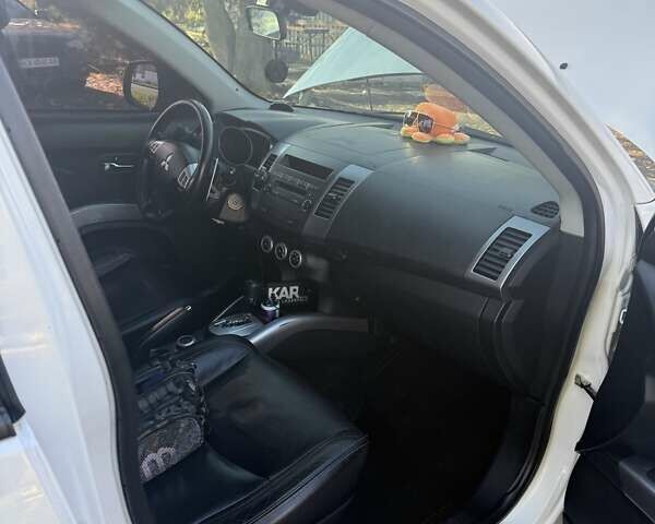 Білий Міцубісі Аутлендер, об'ємом двигуна 2.4 л та пробігом 230 тис. км за 9000 $, фото 15 на Automoto.ua