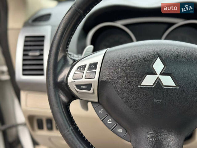 Белый Мицубиси Аутлендер, объемом двигателя 2.36 л и пробегом 160 тыс. км за 9299 $, фото 34 на Automoto.ua