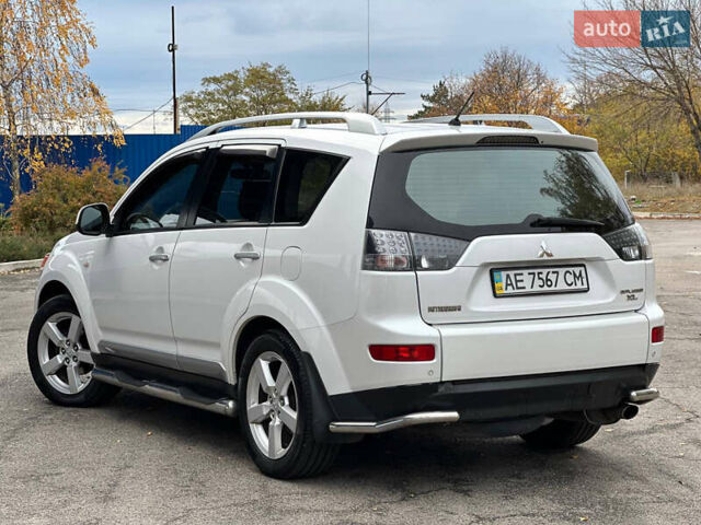 Белый Мицубиси Аутлендер, объемом двигателя 2.36 л и пробегом 160 тыс. км за 9299 $, фото 9 на Automoto.ua
