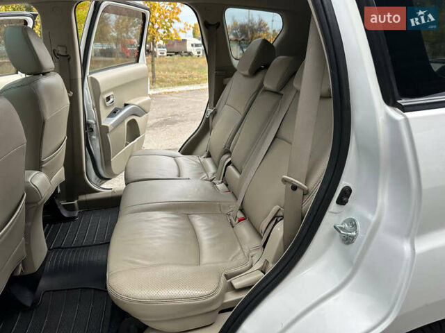 Белый Мицубиси Аутлендер, объемом двигателя 2.36 л и пробегом 160 тыс. км за 9299 $, фото 25 на Automoto.ua