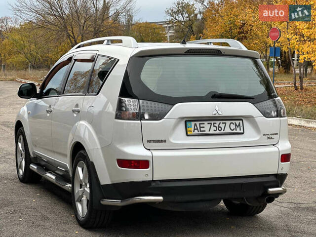 Белый Мицубиси Аутлендер, объемом двигателя 2.36 л и пробегом 160 тыс. км за 9299 $, фото 7 на Automoto.ua