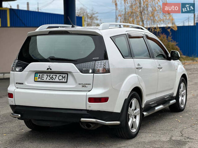 Белый Мицубиси Аутлендер, объемом двигателя 2.36 л и пробегом 160 тыс. км за 9299 $, фото 5 на Automoto.ua