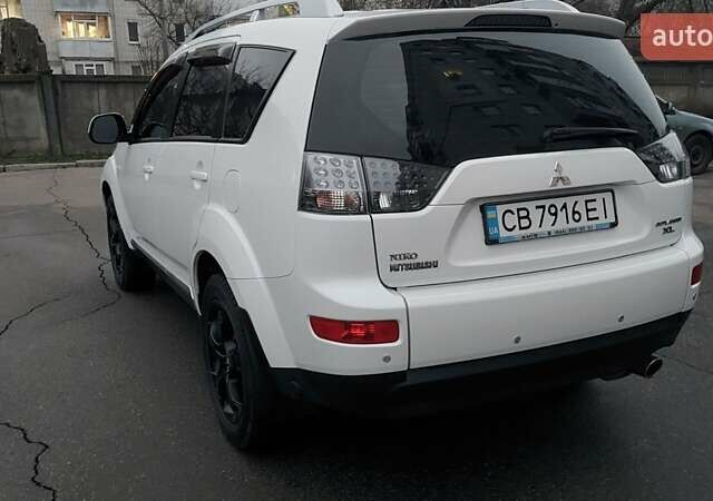 Белый Мицубиси Аутлендер, объемом двигателя 2.36 л и пробегом 186 тыс. км за 9250 $, фото 11 на Automoto.ua