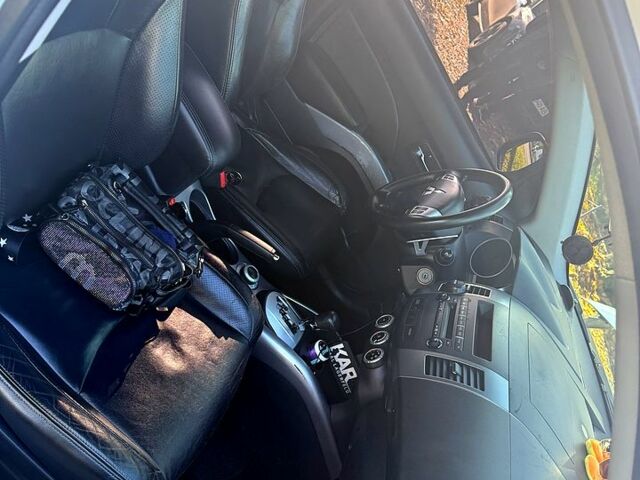 Белый Мицубиси Аутлендер, объемом двигателя 2.4 л и пробегом 230 тыс. км за 9000 $, фото 5 на Automoto.ua