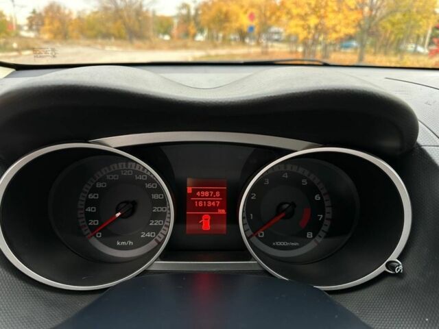 Білий Міцубісі Аутлендер, об'ємом двигуна 2.4 л та пробігом 160 тис. км за 9299 $, фото 19 на Automoto.ua