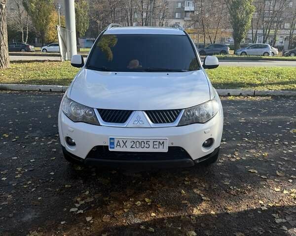 Білий Міцубісі Аутлендер, об'ємом двигуна 2.4 л та пробігом 230 тис. км за 9000 $, фото 6 на Automoto.ua