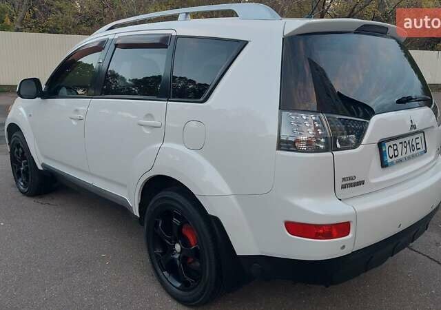 Белый Мицубиси Аутлендер, объемом двигателя 2.36 л и пробегом 185 тыс. км за 8950 $, фото 15 на Automoto.ua