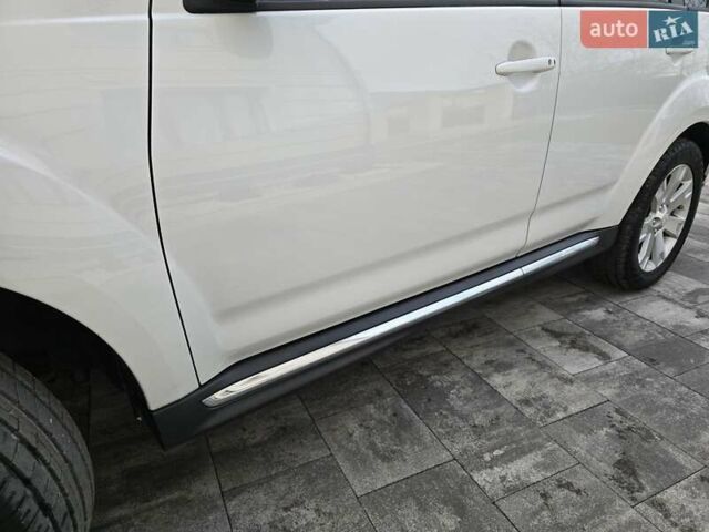 Білий Міцубісі Аутлендер, об'ємом двигуна 2.36 л та пробігом 178 тис. км за 10200 $, фото 65 на Automoto.ua