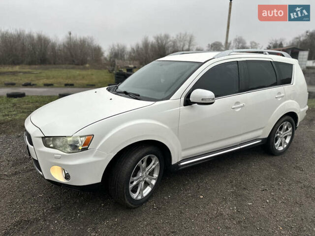 Белый Мицубиси Аутлендер, объемом двигателя 2.2 л и пробегом 266 тыс. км за 9300 $, фото 3 на Automoto.ua