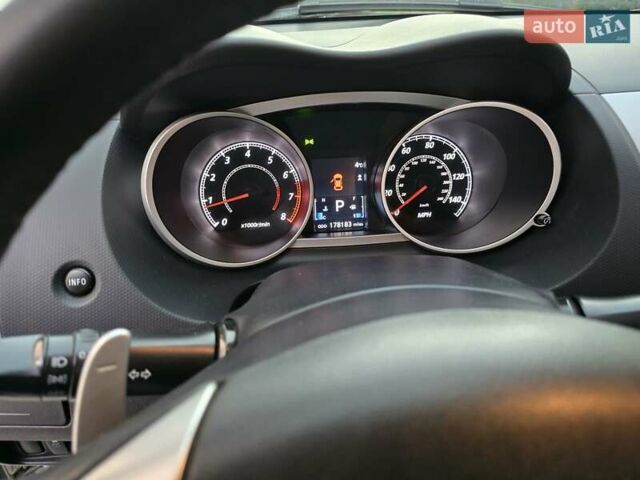 Білий Міцубісі Аутлендер, об'ємом двигуна 2.36 л та пробігом 178 тис. км за 10200 $, фото 18 на Automoto.ua