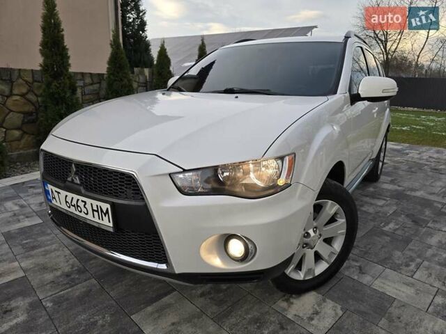 Білий Міцубісі Аутлендер, об'ємом двигуна 2.36 л та пробігом 178 тис. км за 10200 $, фото 67 на Automoto.ua