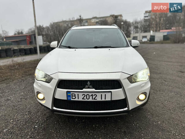 Белый Мицубиси Аутлендер, объемом двигателя 2.2 л и пробегом 266 тыс. км за 9300 $, фото 2 на Automoto.ua