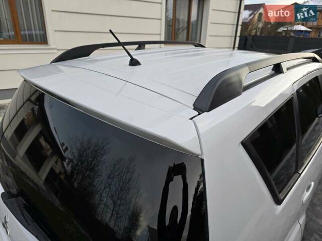 Білий Міцубісі Аутлендер, об'ємом двигуна 2.36 л та пробігом 178 тис. км за 10200 $, фото 58 на Automoto.ua
