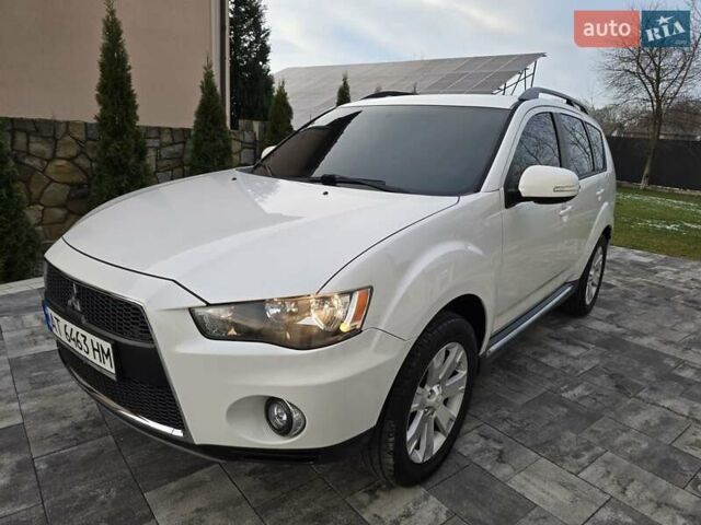 Білий Міцубісі Аутлендер, об'ємом двигуна 2.36 л та пробігом 178 тис. км за 10200 $, фото 1 на Automoto.ua