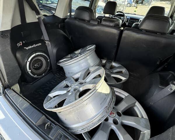 Белый Мицубиси Аутлендер, объемом двигателя 2.18 л и пробегом 271 тыс. км за 8700 $, фото 21 на Automoto.ua