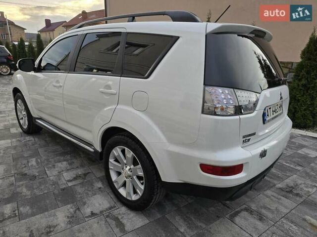 Білий Міцубісі Аутлендер, об'ємом двигуна 2.36 л та пробігом 178 тис. км за 10200 $, фото 5 на Automoto.ua
