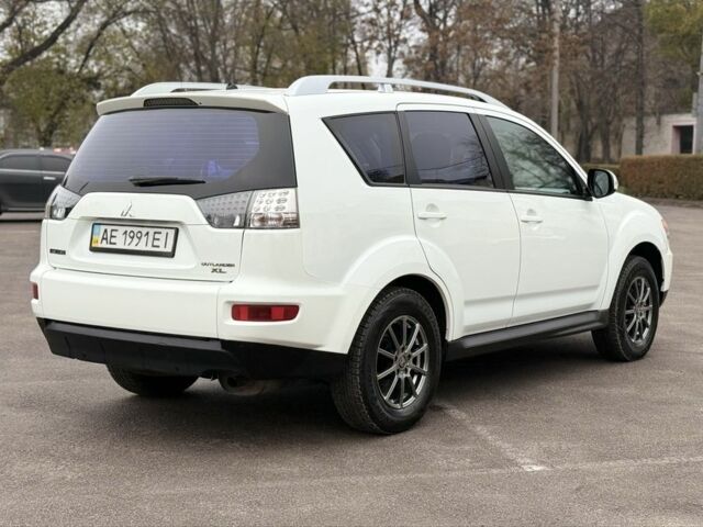 Білий Міцубісі Аутлендер, об'ємом двигуна 2.4 л та пробігом 250 тис. км за 10000 $, фото 2 на Automoto.ua