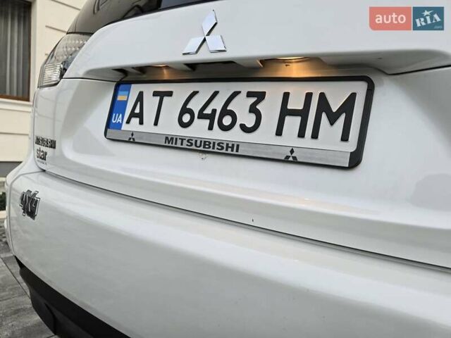 Білий Міцубісі Аутлендер, об'ємом двигуна 2.36 л та пробігом 178 тис. км за 10200 $, фото 60 на Automoto.ua