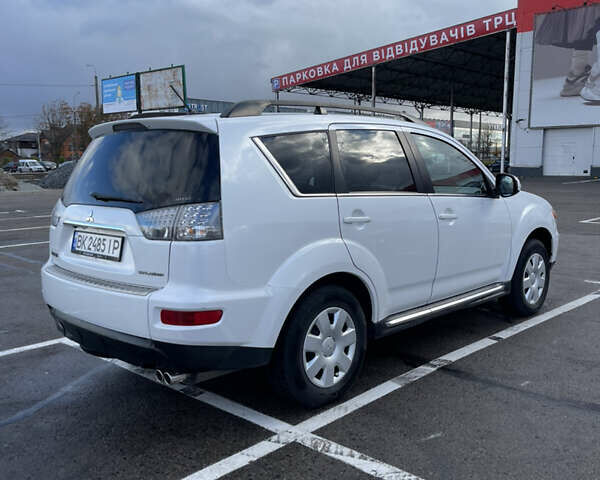 Білий Міцубісі Аутлендер, об'ємом двигуна 2.18 л та пробігом 198 тис. км за 11500 $, фото 4 на Automoto.ua