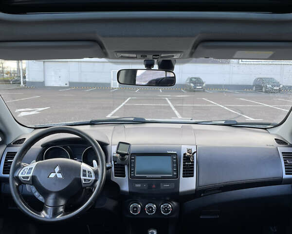 Білий Міцубісі Аутлендер, об'ємом двигуна 2.18 л та пробігом 198 тис. км за 11500 $, фото 23 на Automoto.ua