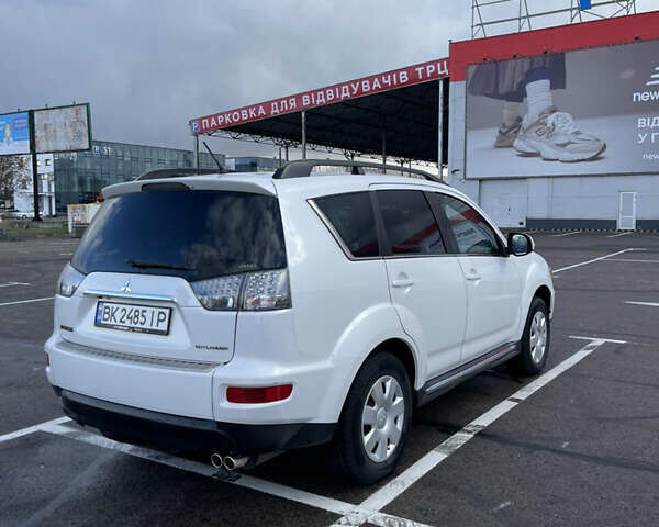 Білий Міцубісі Аутлендер, об'ємом двигуна 2.18 л та пробігом 198 тис. км за 11500 $, фото 13 на Automoto.ua