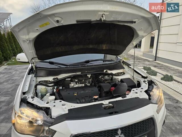 Білий Міцубісі Аутлендер, об'ємом двигуна 2.36 л та пробігом 178 тис. км за 10200 $, фото 38 на Automoto.ua