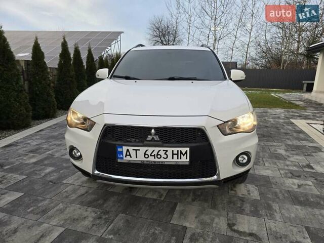 Білий Міцубісі Аутлендер, об'ємом двигуна 2.36 л та пробігом 178 тис. км за 10200 $, фото 12 на Automoto.ua