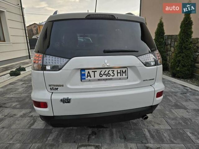 Білий Міцубісі Аутлендер, об'ємом двигуна 2.36 л та пробігом 178 тис. км за 10200 $, фото 71 на Automoto.ua