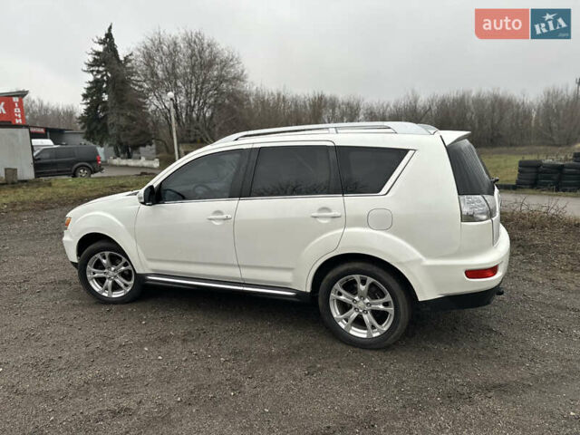 Белый Мицубиси Аутлендер, объемом двигателя 2.2 л и пробегом 266 тыс. км за 9300 $, фото 5 на Automoto.ua
