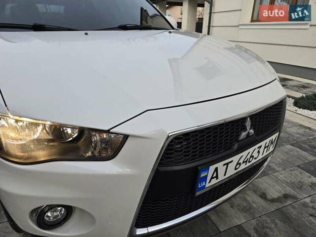 Білий Міцубісі Аутлендер, об'ємом двигуна 2.36 л та пробігом 178 тис. км за 10200 $, фото 47 на Automoto.ua