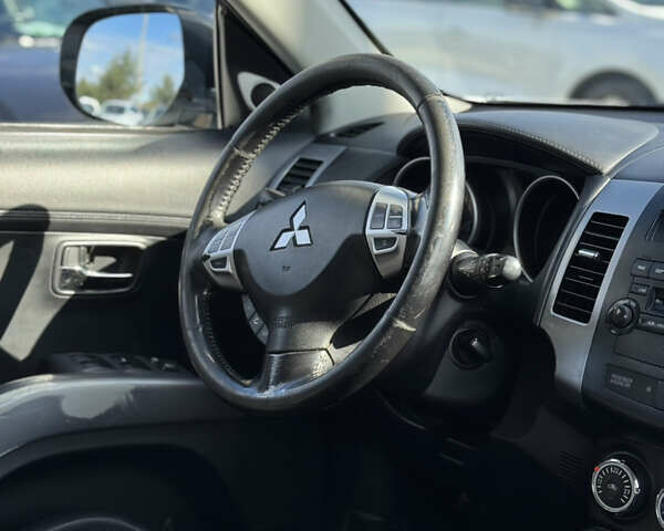 Белый Мицубиси Аутлендер, объемом двигателя 2.18 л и пробегом 271 тыс. км за 8700 $, фото 28 на Automoto.ua