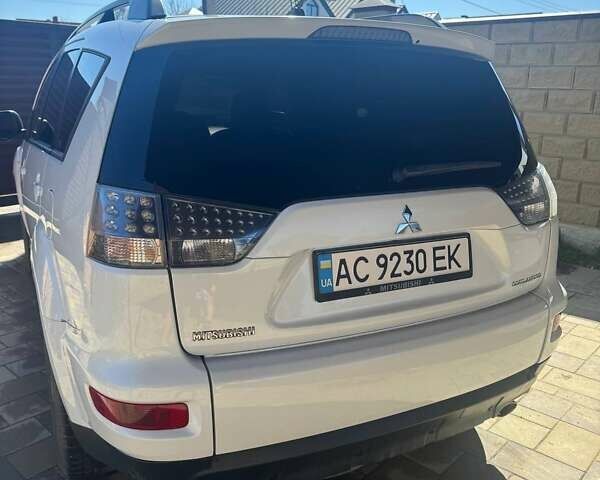 Білий Міцубісі Аутлендер, об'ємом двигуна 2.4 л та пробігом 211 тис. км за 7999 $, фото 17 на Automoto.ua