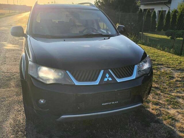 Белый Мицубиси Аутлендер, объемом двигателя 2 л и пробегом 170 тыс. км за 3744 $, фото 9 на Automoto.ua