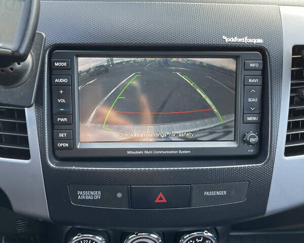 Білий Міцубісі Аутлендер, об'ємом двигуна 2.18 л та пробігом 198 тис. км за 11500 $, фото 22 на Automoto.ua