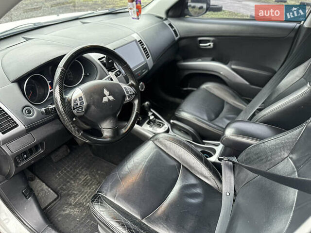 Белый Мицубиси Аутлендер, объемом двигателя 2.2 л и пробегом 266 тыс. км за 9300 $, фото 13 на Automoto.ua
