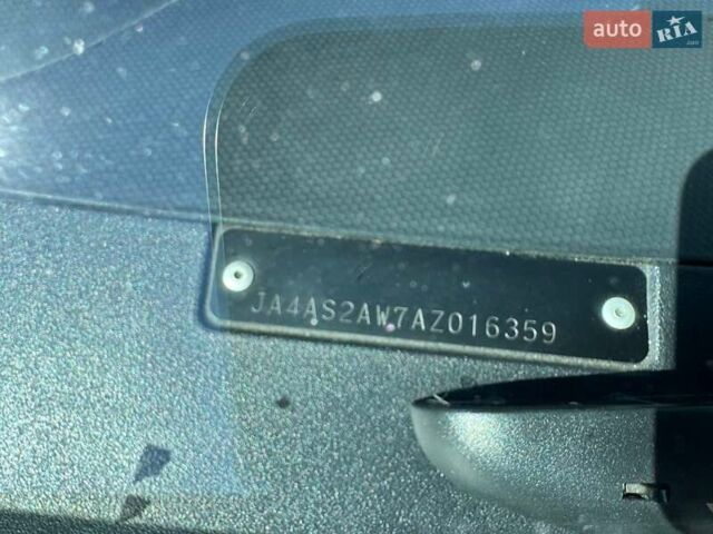 Білий Міцубісі Аутлендер, об'ємом двигуна 2.4 л та пробігом 211 тис. км за 7999 $, фото 9 на Automoto.ua