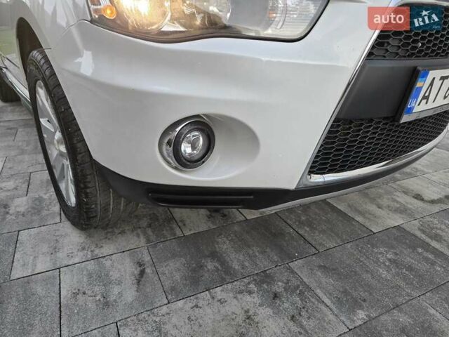 Білий Міцубісі Аутлендер, об'ємом двигуна 2.36 л та пробігом 178 тис. км за 10200 $, фото 48 на Automoto.ua