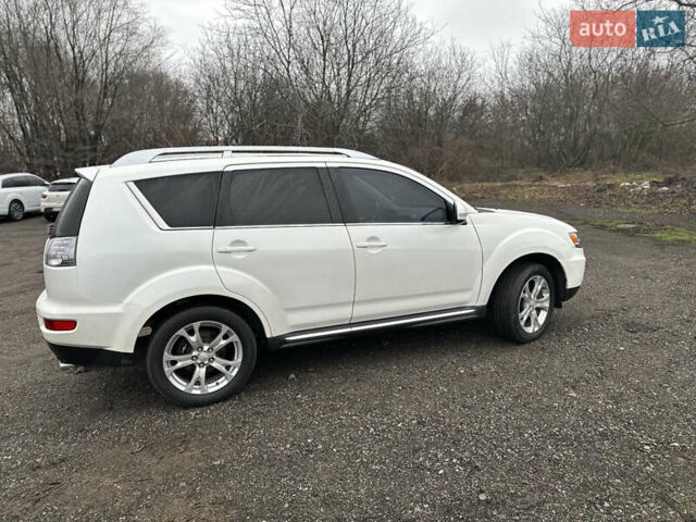 Белый Мицубиси Аутлендер, объемом двигателя 2.2 л и пробегом 266 тыс. км за 9300 $, фото 8 на Automoto.ua