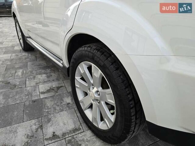 Білий Міцубісі Аутлендер, об'ємом двигуна 2.36 л та пробігом 178 тис. км за 10200 $, фото 62 на Automoto.ua