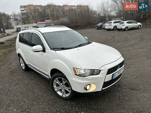 Белый Мицубиси Аутлендер, объемом двигателя 2.2 л и пробегом 266 тыс. км за 9300 $, фото 1 на Automoto.ua