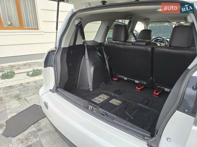 Білий Міцубісі Аутлендер, об'ємом двигуна 2.36 л та пробігом 178 тис. км за 10200 $, фото 33 на Automoto.ua