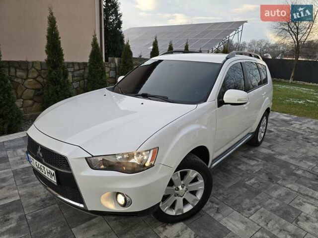 Білий Міцубісі Аутлендер, об'ємом двигуна 2.36 л та пробігом 178 тис. км за 10200 $, фото 68 на Automoto.ua