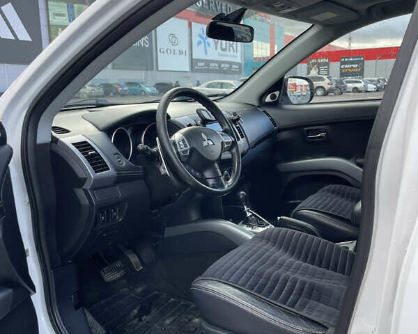 Білий Міцубісі Аутлендер, об'ємом двигуна 2.18 л та пробігом 198 тис. км за 11500 $, фото 24 на Automoto.ua